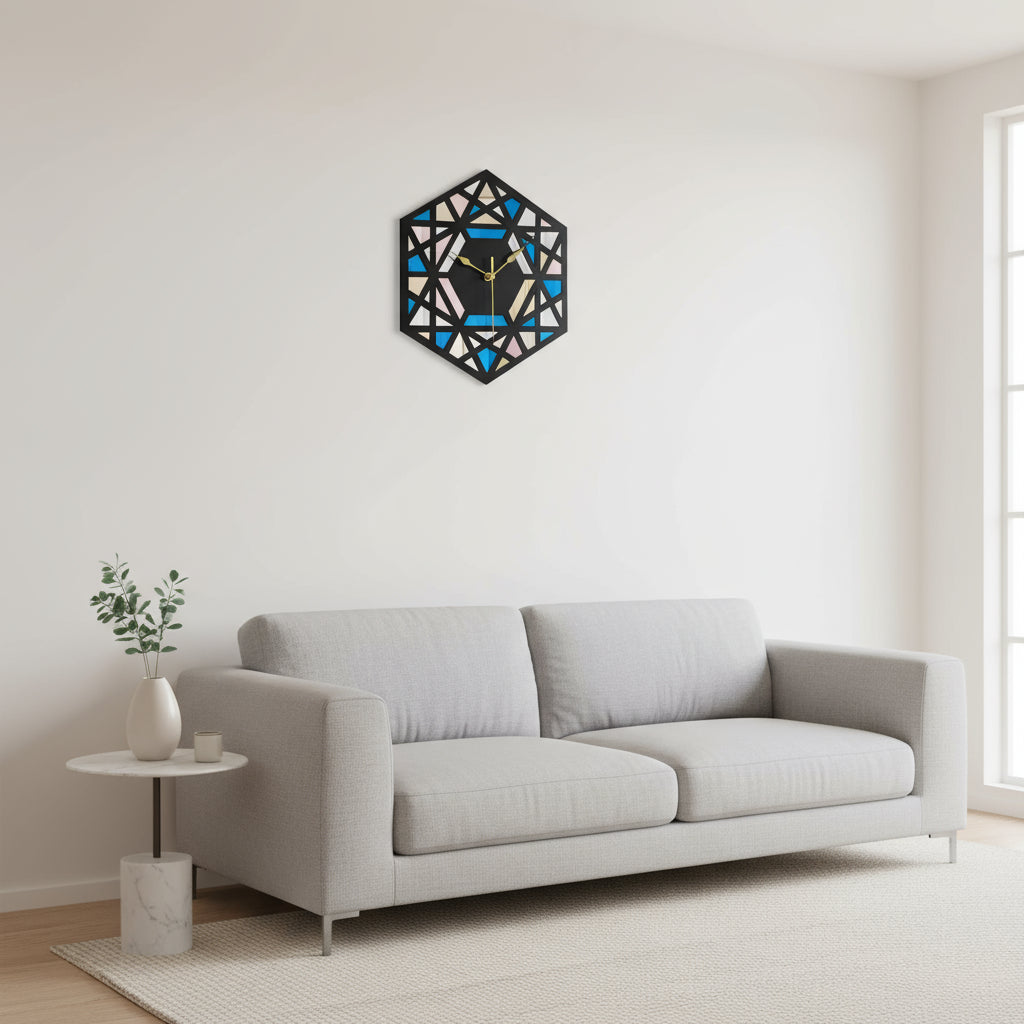 Geometric wall clock with a black frame on a teal background