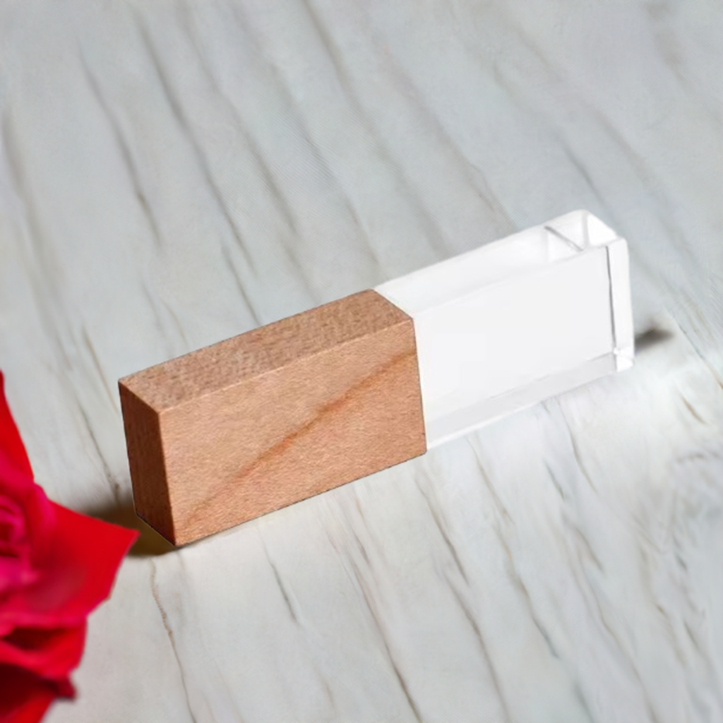 The USB drive placed on a soft fabric background, reflecting its smooth finish and high-quality material.