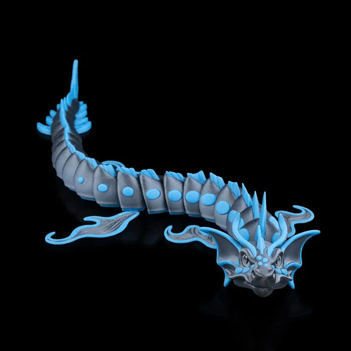 Close-up of the Abyssal Dragon showing its intricate scales, smooth 3D-printed texture, and moveable limbs designed for customizable posing.