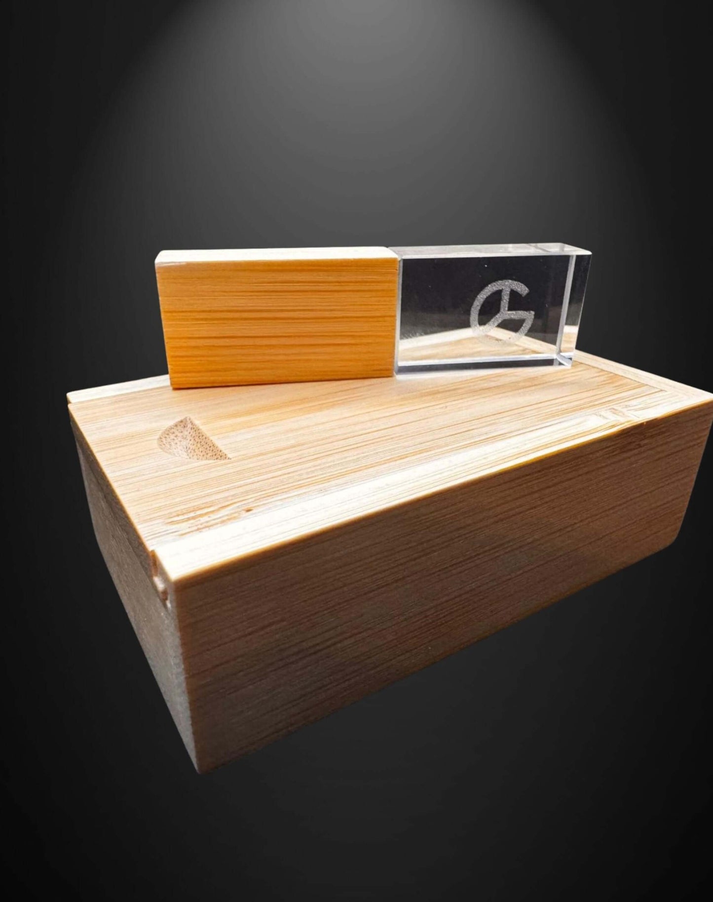 A flat lay of the USB drive and box, surrounded by delicate wedding decorations, showing its perfect fit as a luxury wedding gift.