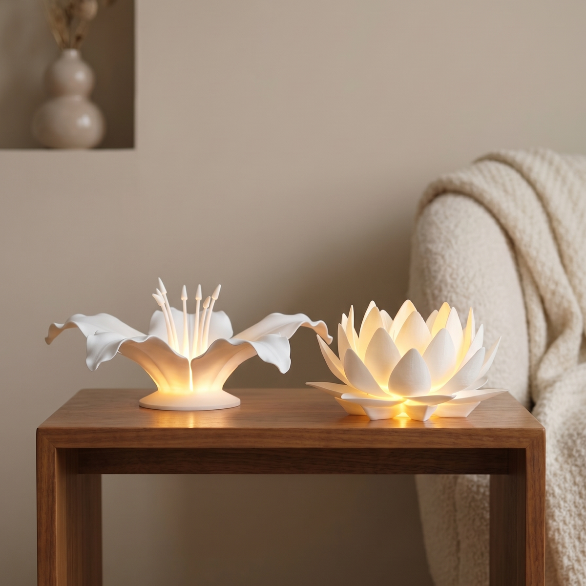 Two decorative lamps shaped like lotus flowers on a wooden table.