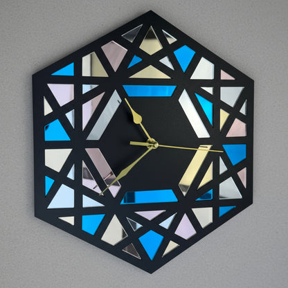 Geometric hexagonal wall clock with colorful design on a gray background