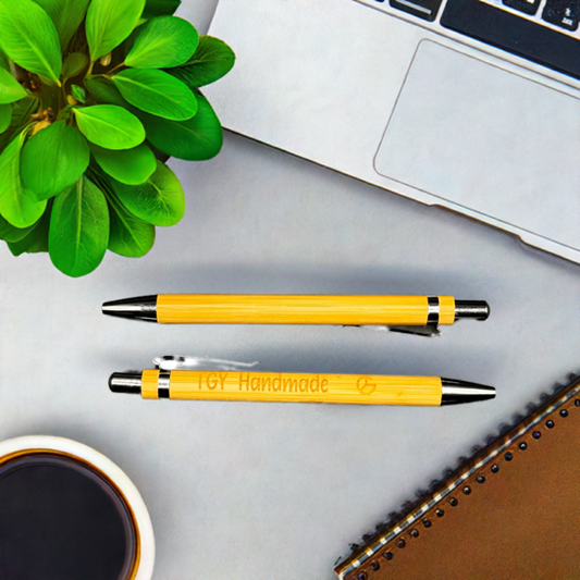 A sleek bamboo pen with an elegant natural wood finish, engraved with a personalised name. A perfect blend of style and sustainability.