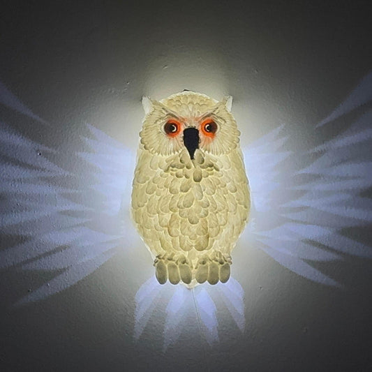 Front view of the Hedwig the Owl Night Lamp, showcasing its detailed 3D-printed owl design with wings spread, creating a soft glow