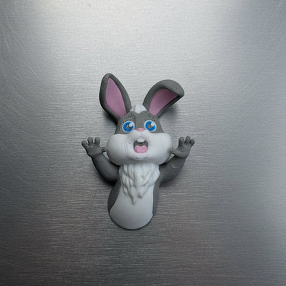 Cartoon rabbit character magnet on a metallic surface