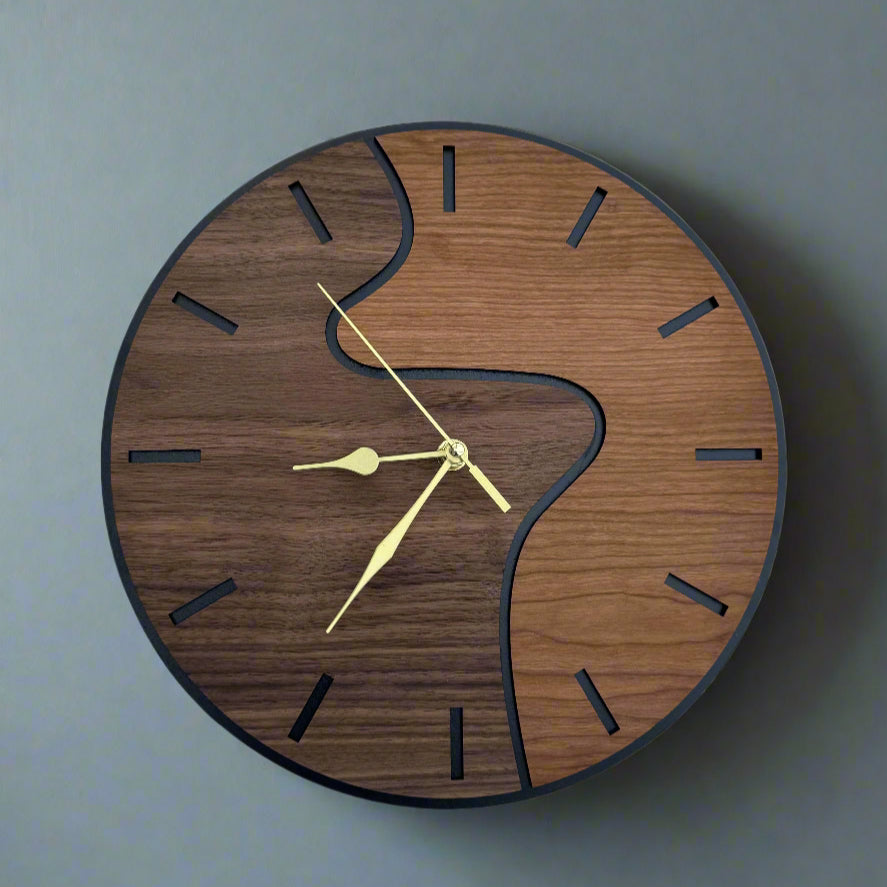 Wooden wall clock with gold hands on a gray background