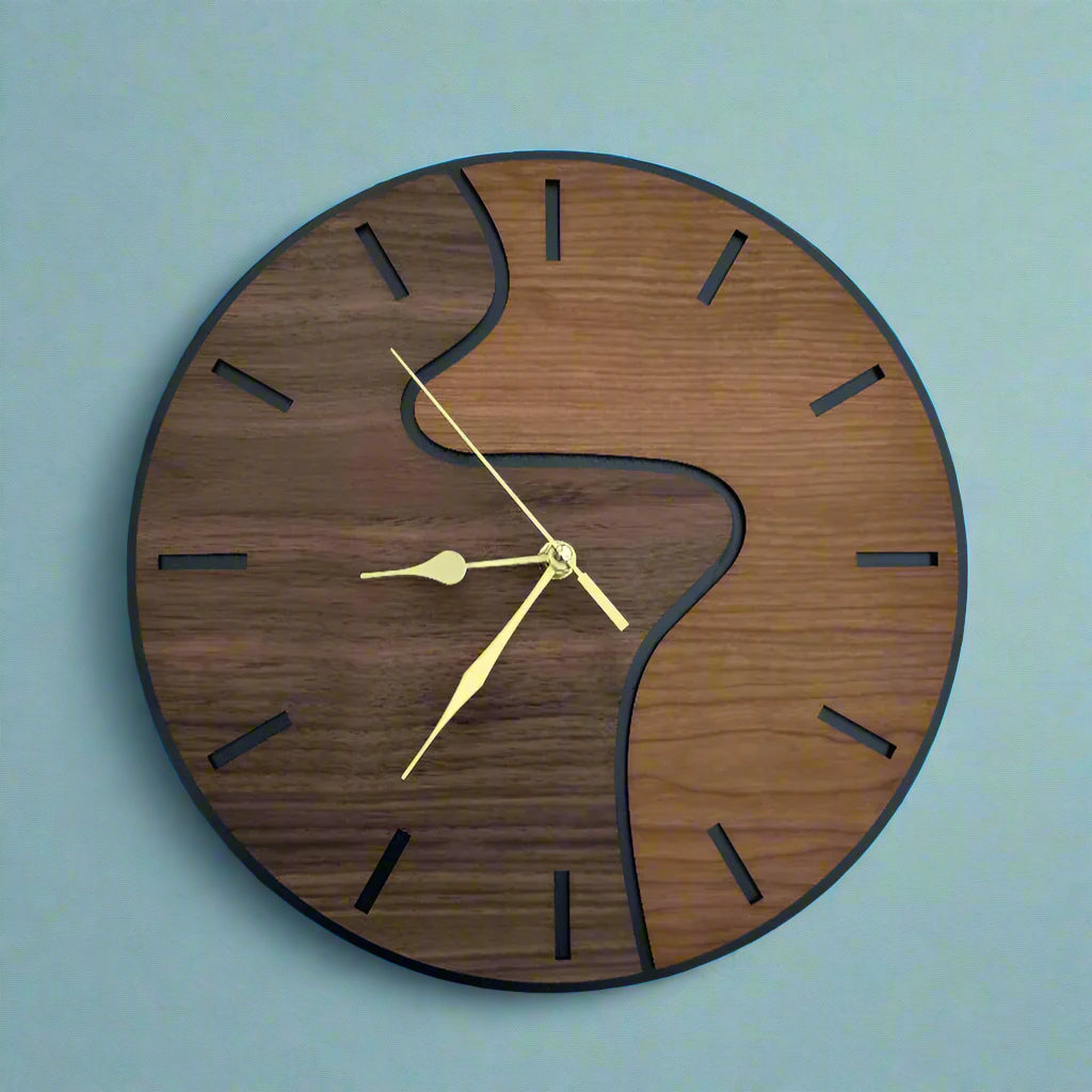 Wooden wall clock with gold hands on a gray background