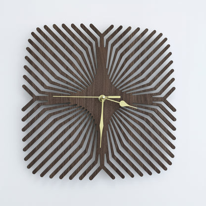 Decorative wall clock with a unique design on a blue background