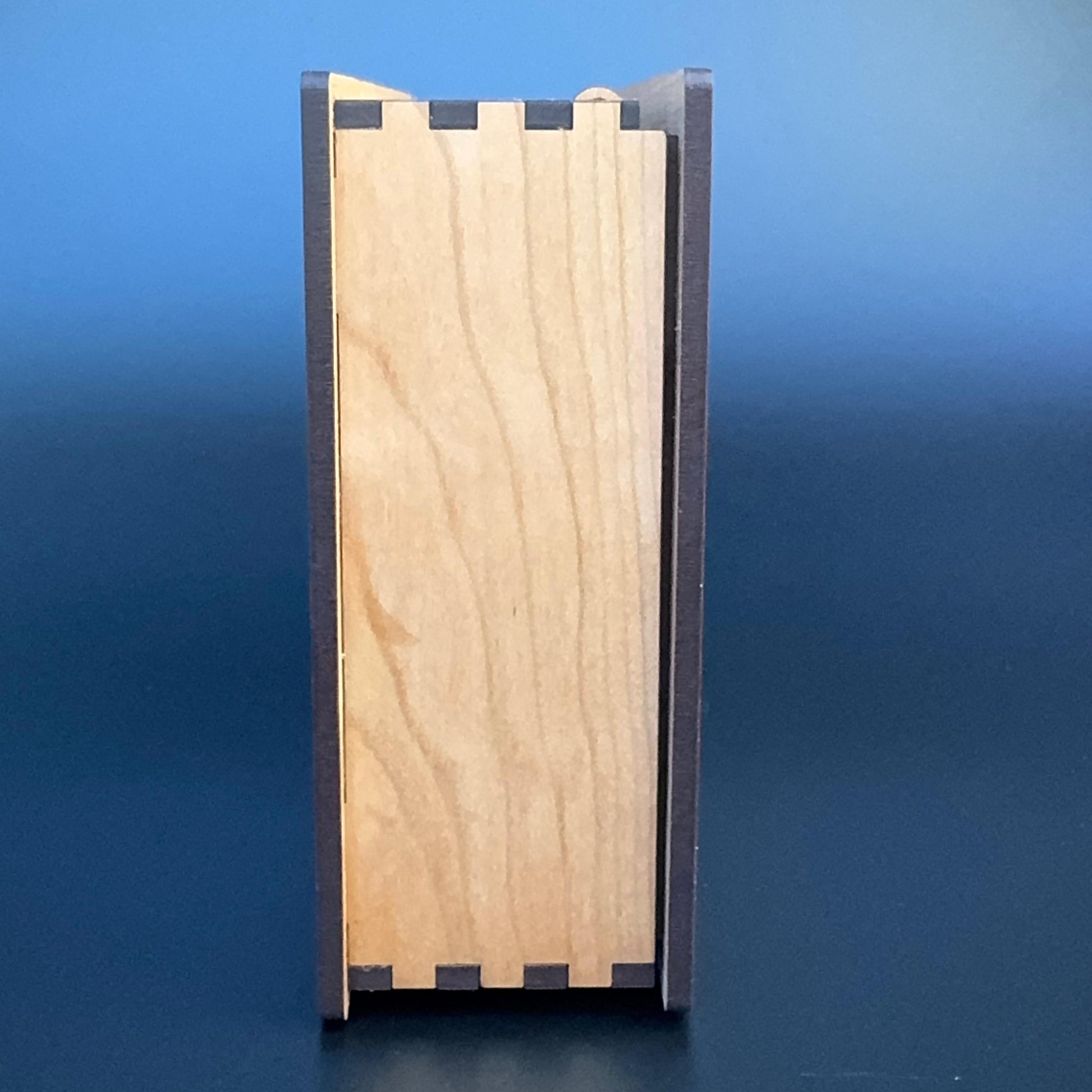 Wooden box with a blue gradient background