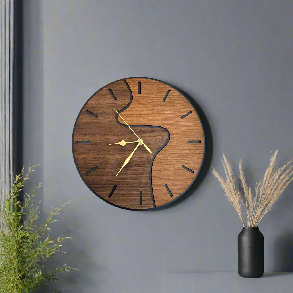 Wooden wall clock with artistic design on a gray wall with decorative elements.