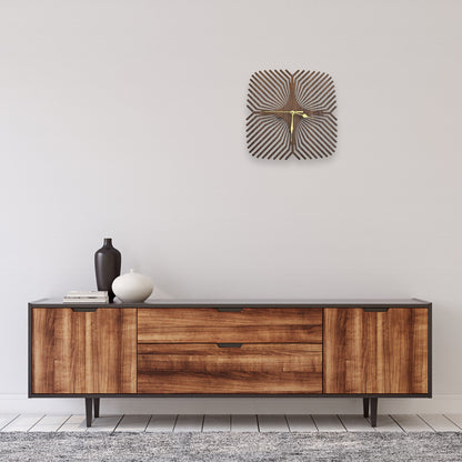 Wooden sideboard with decorative wall clock in a minimalistic room.