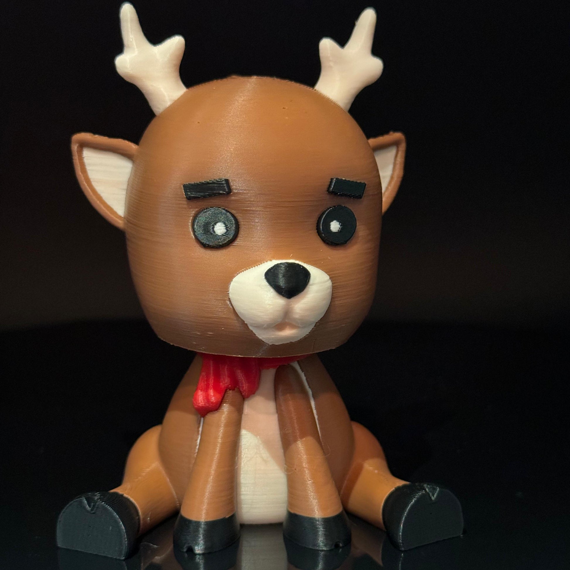 Rudolph the Deer E.T. – a quirky holiday ornament combining a reindeer design with an extraterrestrial touch