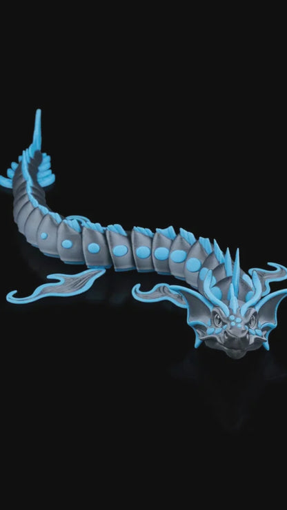 Close-up of the Abyssal Dragon showing its intricate scales, smooth 3D-printed texture, and moveable limbs designed for customizable posing.